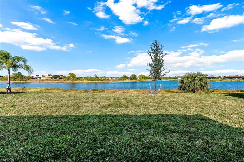 1465 Birdie Drive Naples, FL 34120 - Photo 37 of 38 a view of an ocean and beach