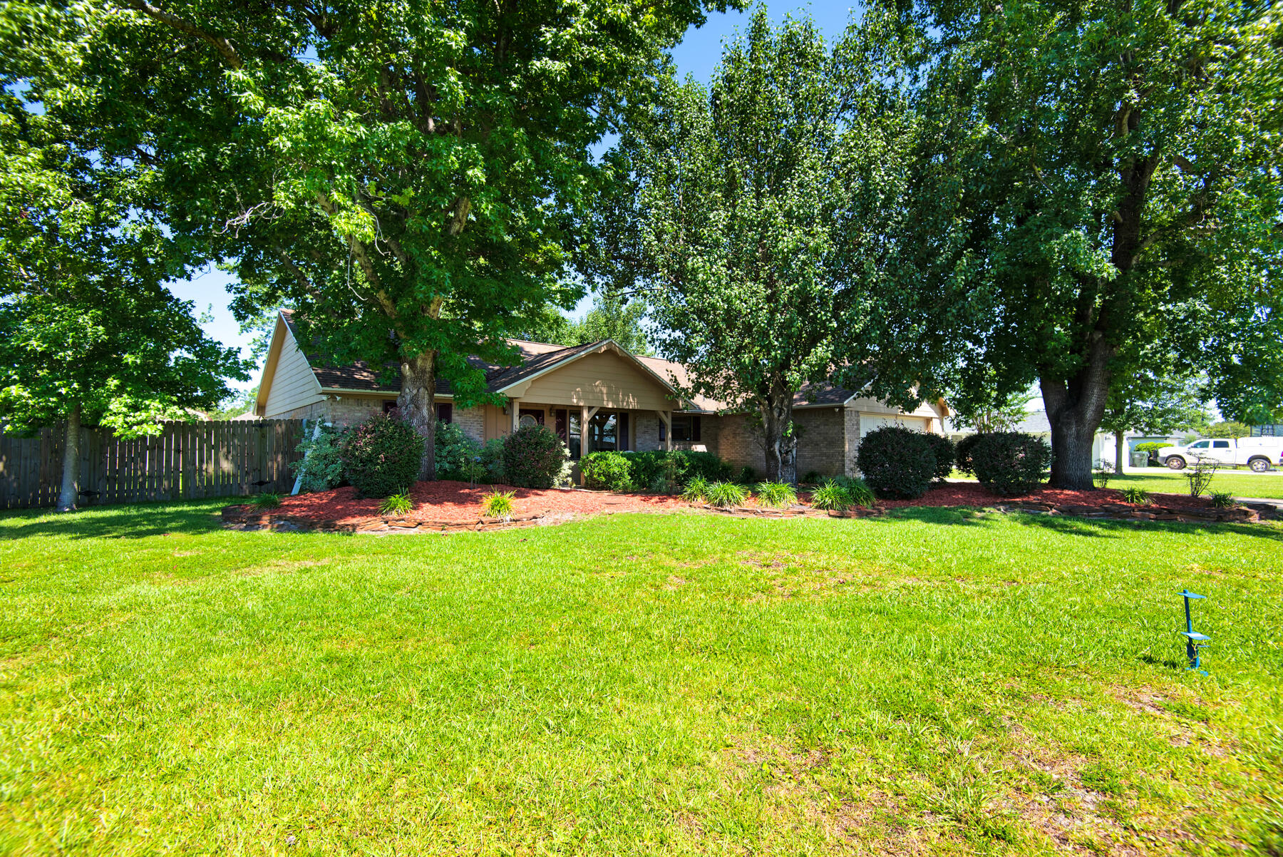 2302 Pentland Road Lynn Haven, FL 32444 - Photo 5 of 40 a front view of a house with garden and trees