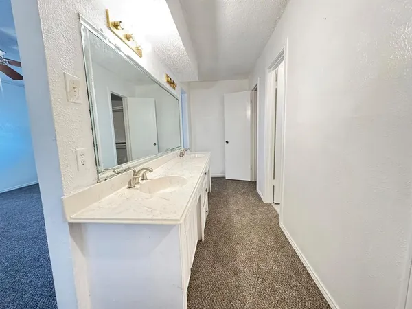 a bathroom with a toilet and a bathtub