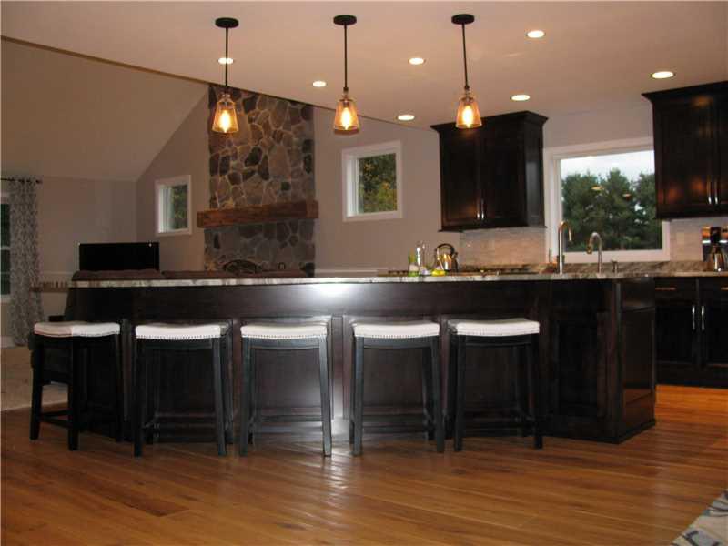 192 South Maysville Road Transfer, PA 16154 - Photo 3 of 25 Kitchen. BRAND NEW CHEIFS DELIGHT MAPLE KITCHEN WITH GRANITE COUNTER, SEATING FOR 5 AT THE CENTER ISLAND, DOUBLE CONVECTION OVEN, 5 BURNER GAS COOK TOP, ROOM FOR GUEST SEATING DINING ROOM TABLE ALL OPEN INTO THE F.R. WITH VAULTED CEILING AND STONE FIREPLACE!!!!!