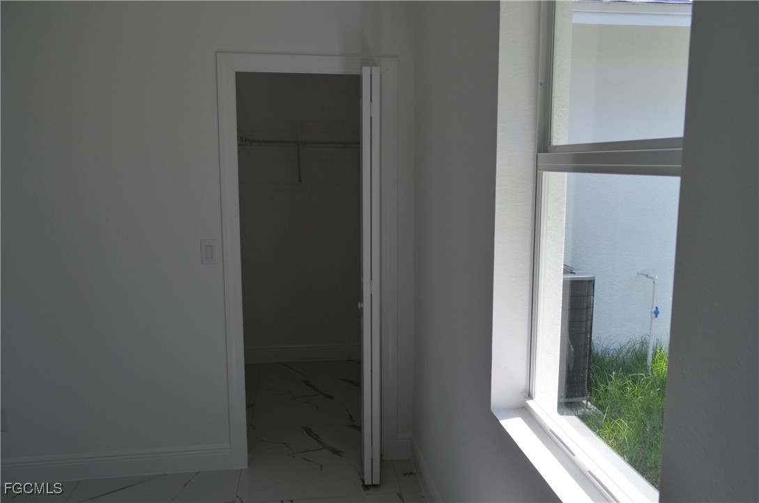 2610 34th Street West Lehigh Acres, FL 33971 - Photo 12 of 14 a view of front door