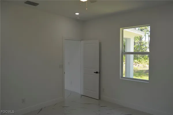 a close view of a sink and a mirror in a bathroom