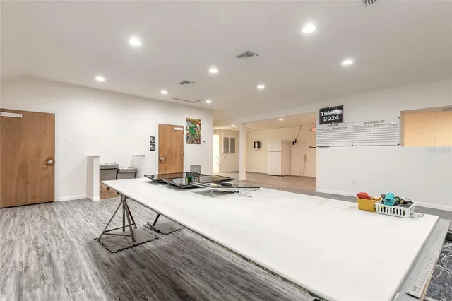 a view of kitchen with wooden floor