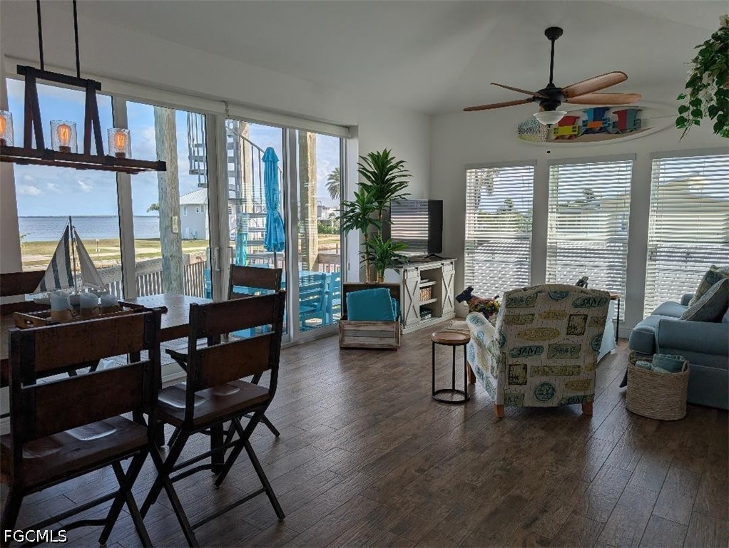 2579 Third Street Matlacha, FL 33993 - Photo 3 of 39 a living room with furniture and a floor to ceiling window