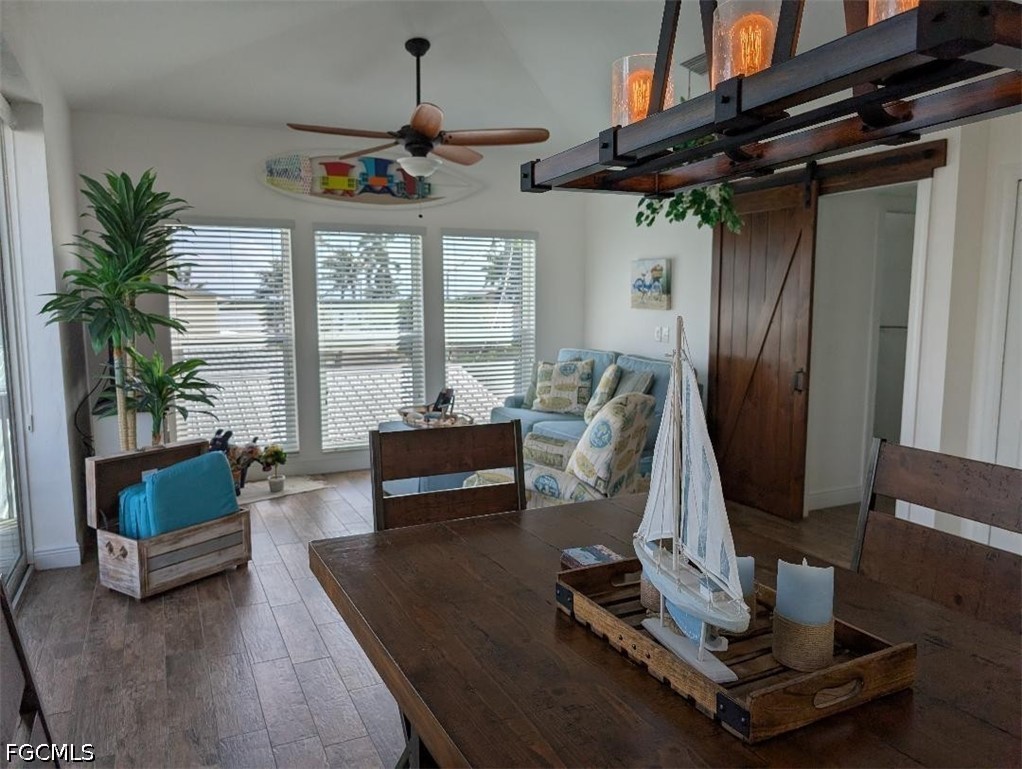 2579 Third Street Matlacha, FL 33993 - Photo 4 of 39 a living room with furniture gym equipment and a chandelier