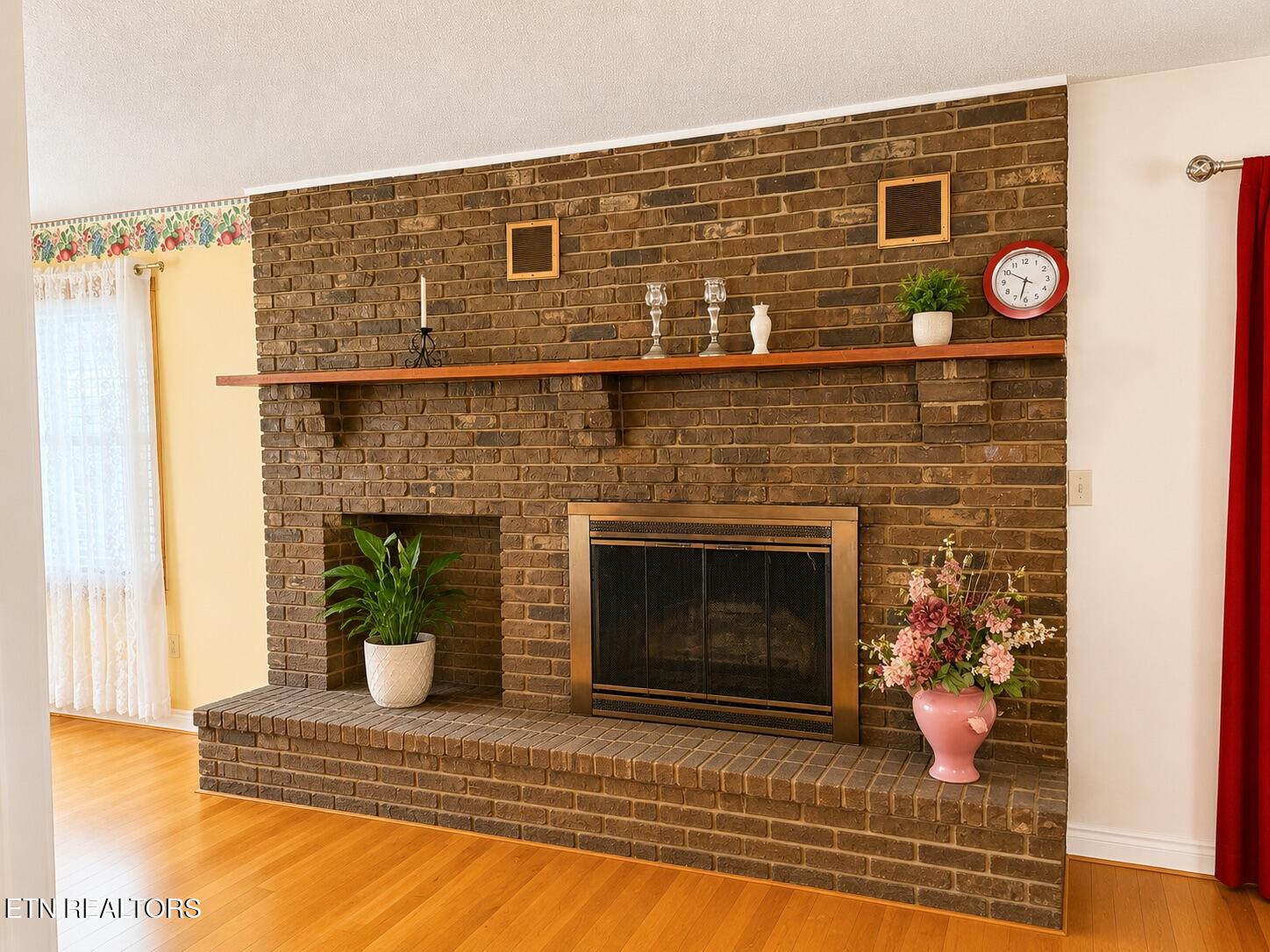 165 Robin Hood Lane Rutledge, TN 37861 - Photo 26 of 42 Cozy living room with brick fireplace