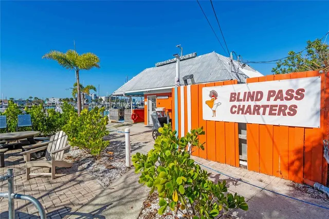 an aerial view of a city with ocean view