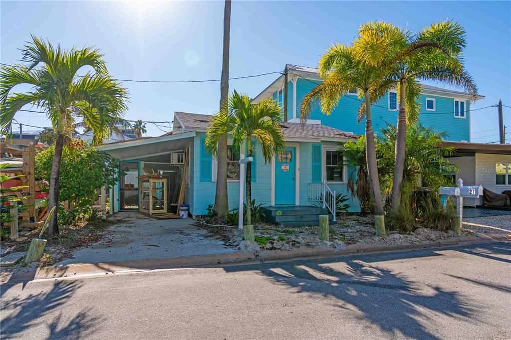 35 79th Terrace Treasure Island, FL 33706 - Photo 21 of 40 a front view of a house with garden