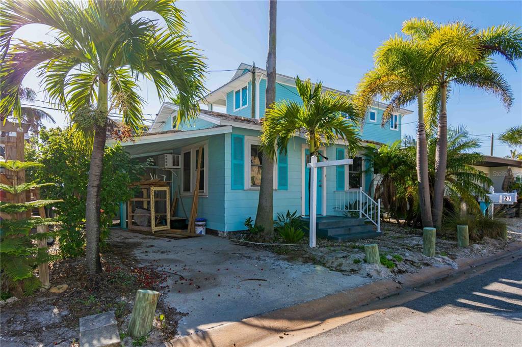 35 79th Terrace Treasure Island, FL 33706 - Photo 25 of 40 a front view of house with yard and green space