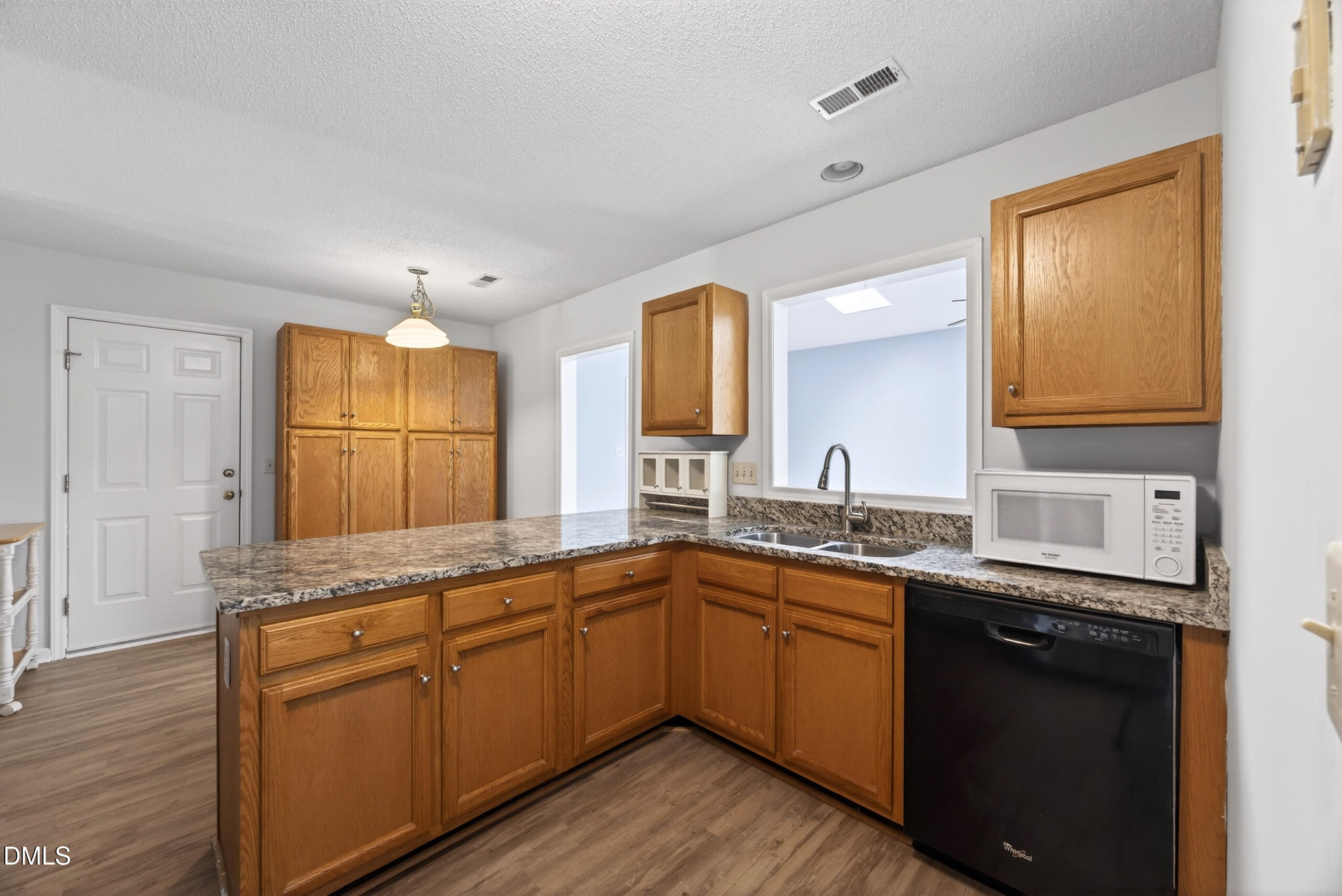 1901 Whites Mill Road High Point, NC 27265 - Photo 9 of 24 a kitchen with a sink stove and cabinets