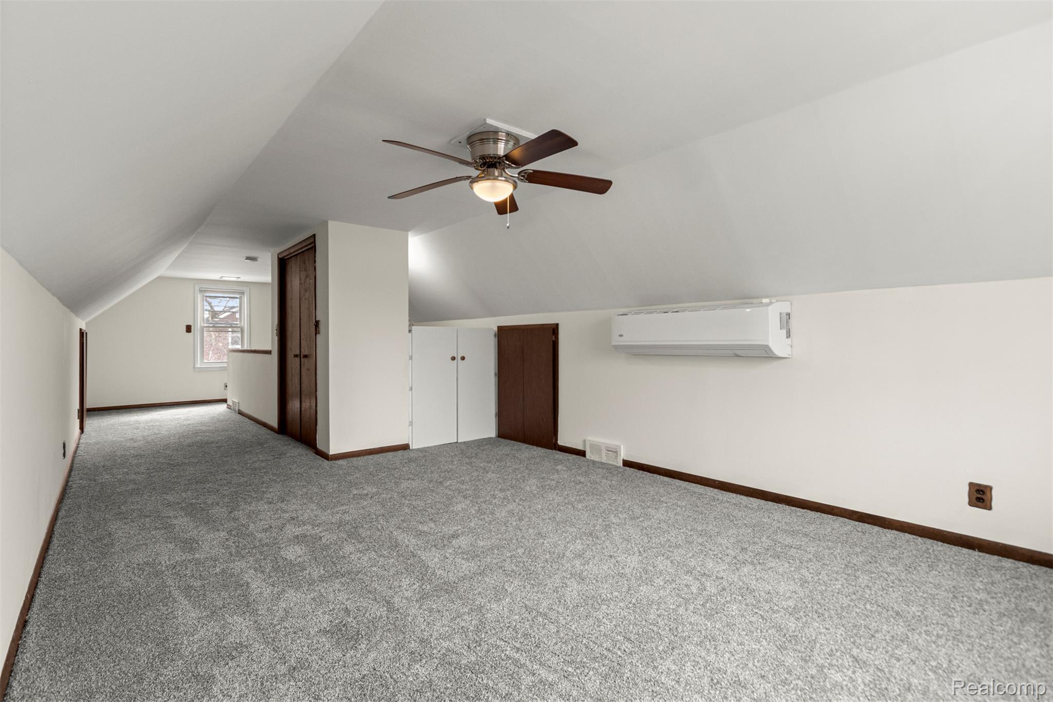 15705 Champaign Road Allen Park, MI 48101 - Photo 21 of 42 Additional living space featuring ceiling fan, lofted ceiling, and carpet floors