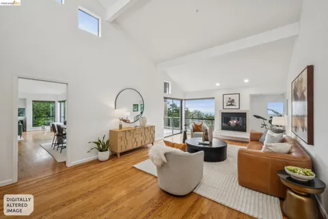 a kitchen with refrigerator and cabinets