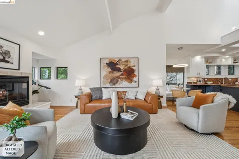 a bedroom with a large bed and a large window