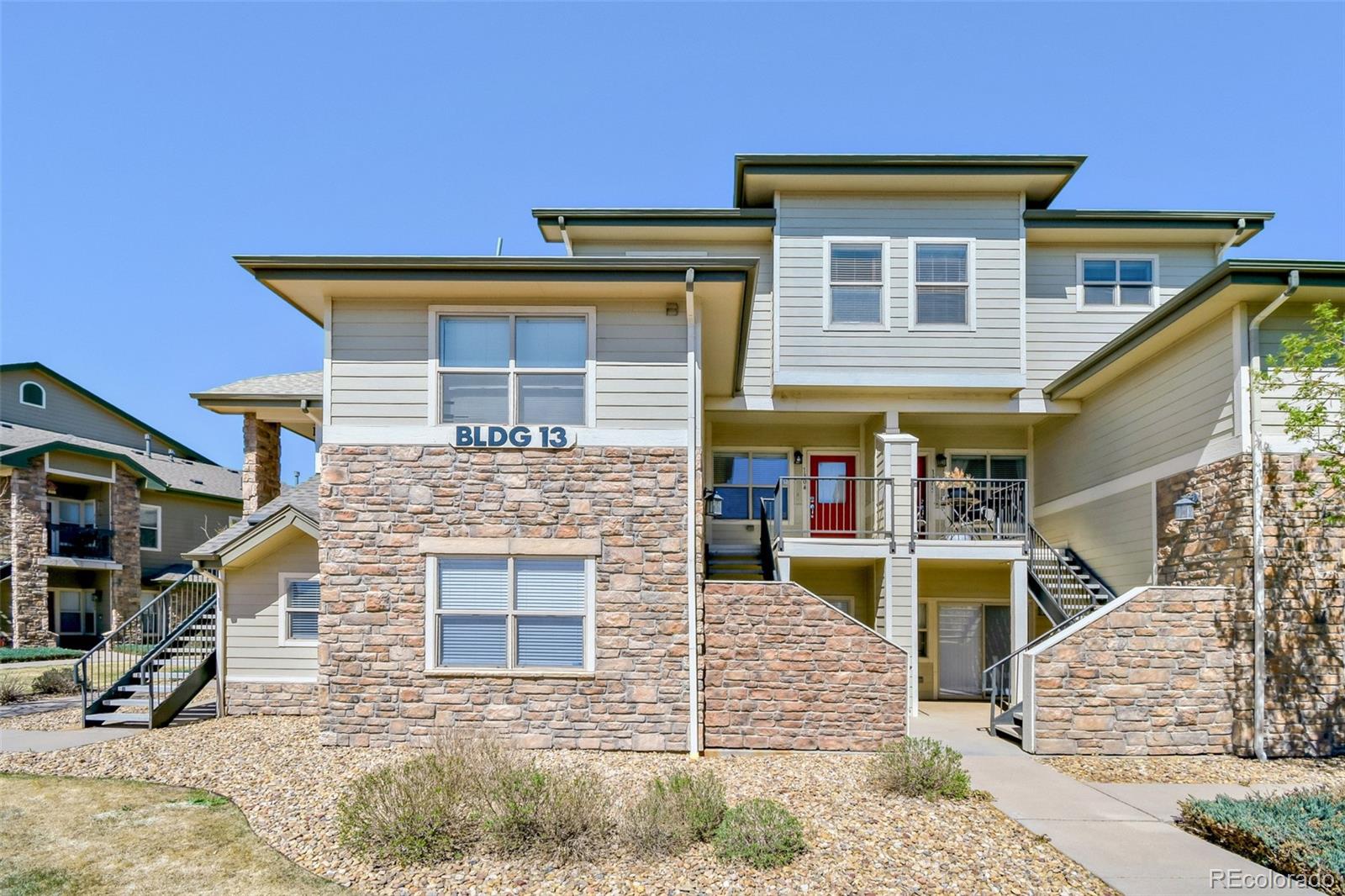 a front view of a house with yard