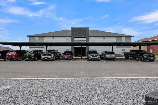 a view of a cars parked in front of a building