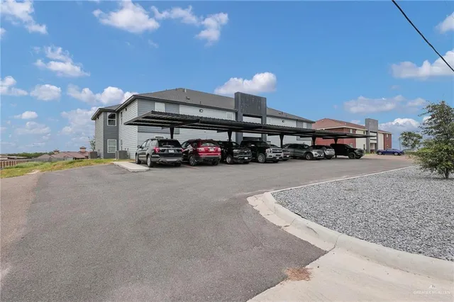 a car parked in front of a house