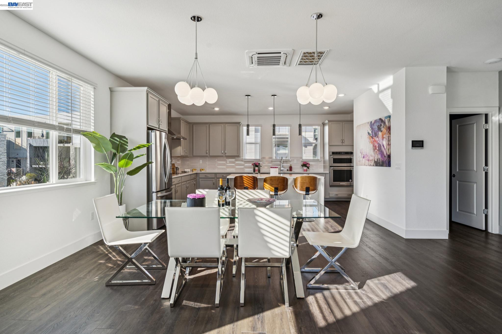 646 Eucalyptus Way Alameda, CA 94501 - Photo 14 of 40 a view of a dining room with furniture window and wooden floor