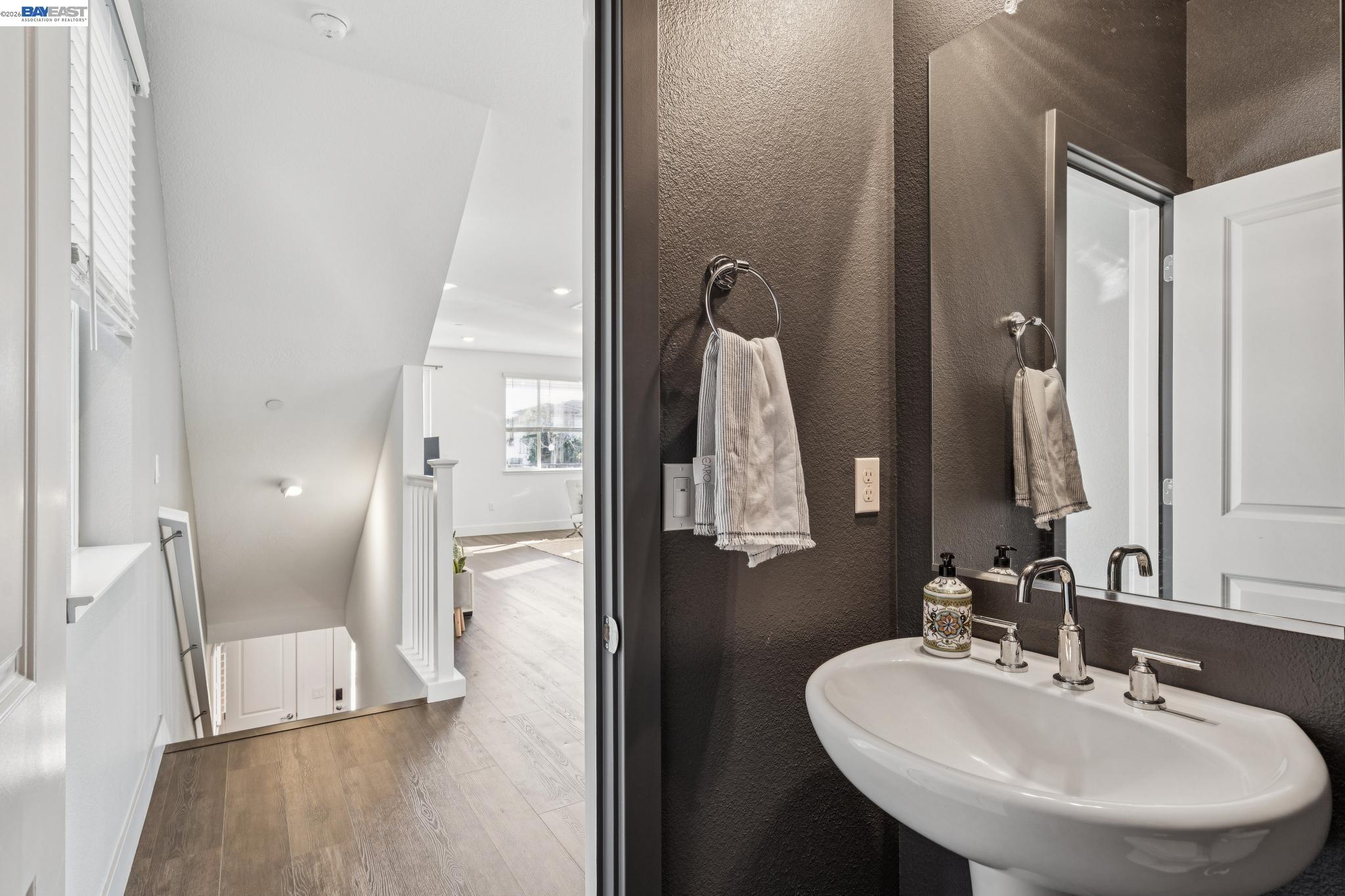 646 Eucalyptus Way Alameda, CA 94501 - Photo 21 of 40 a bathroom with a sink and a mirror
