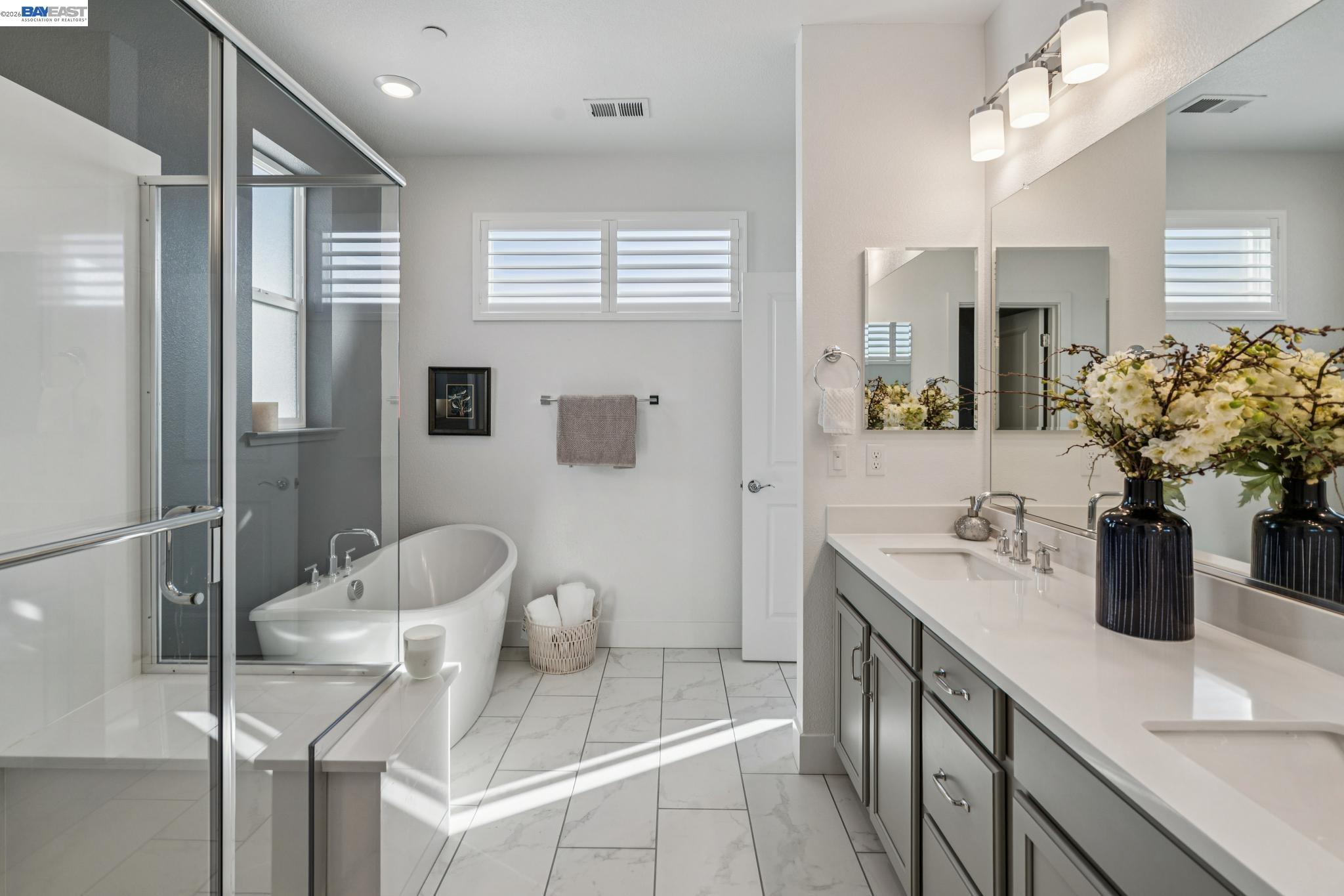 646 Eucalyptus Way Alameda, CA 94501 - Photo 25 of 40 a bathroom with a sink a toilet and shower