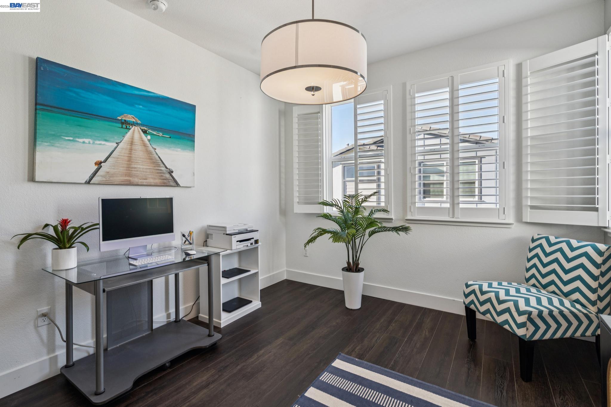 646 Eucalyptus Way Alameda, CA 94501 - Photo 30 of 40 a workspace with furniture and a potted plant