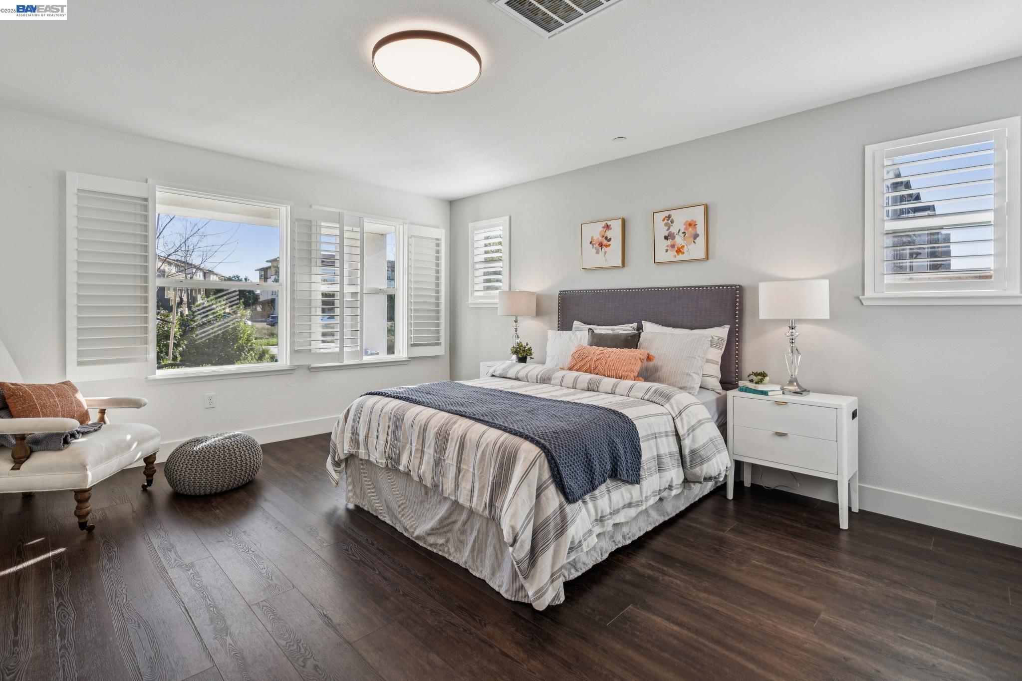 646 Eucalyptus Way Alameda, CA 94501 - Photo 7 of 40 a bed room with a bed and a chair