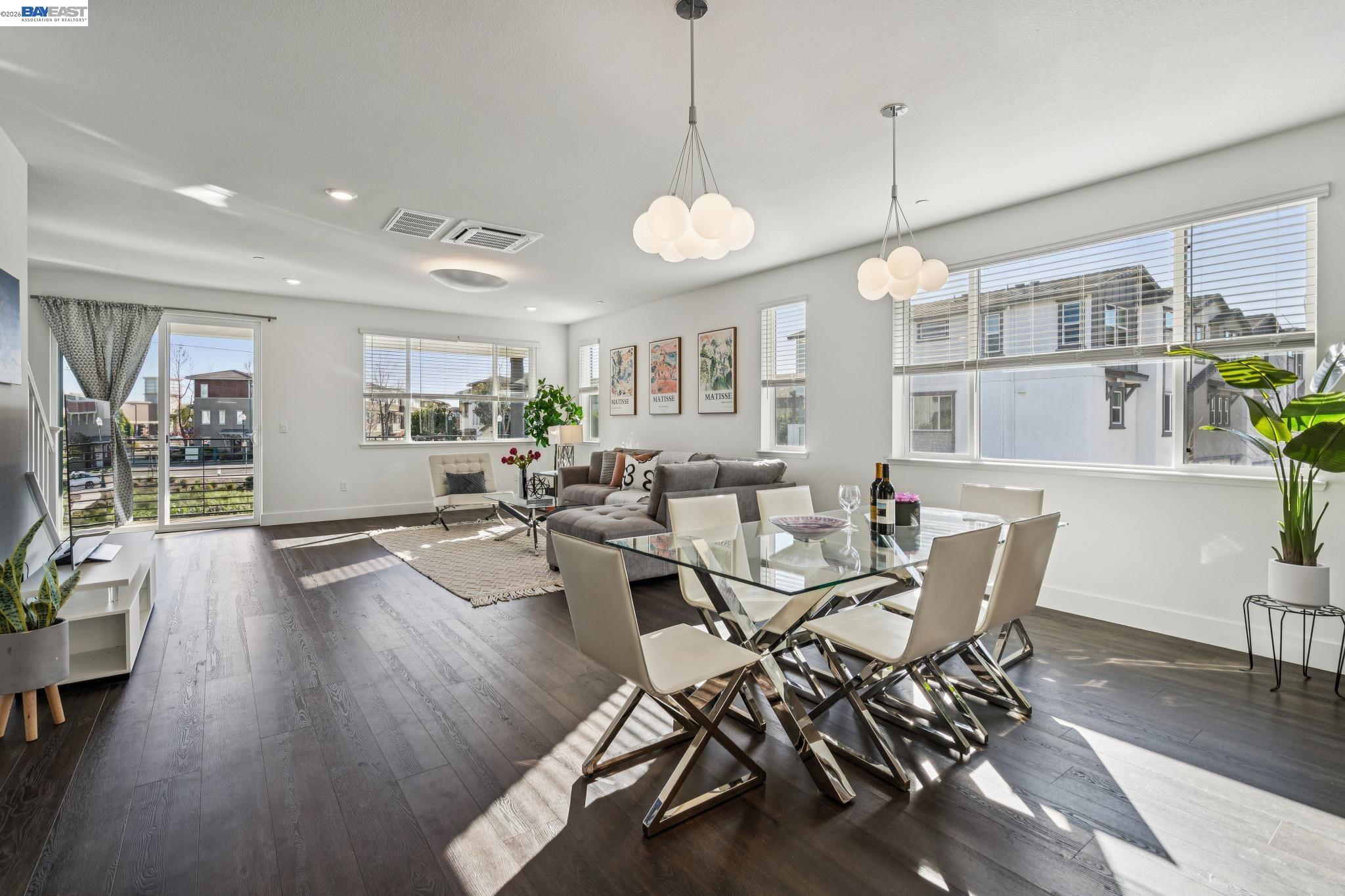 646 Eucalyptus Way Alameda, CA 94501 - Photo 10 of 40 a view of a dining area with furniture window and wooden floor