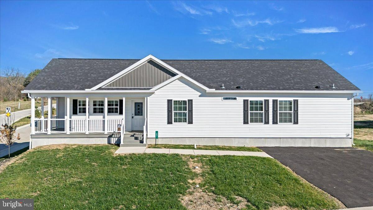 1412 Heytesbury Road Walnutport, PA 18088 - Photo 1 of 39 Charming home with inviting porch and greenery.