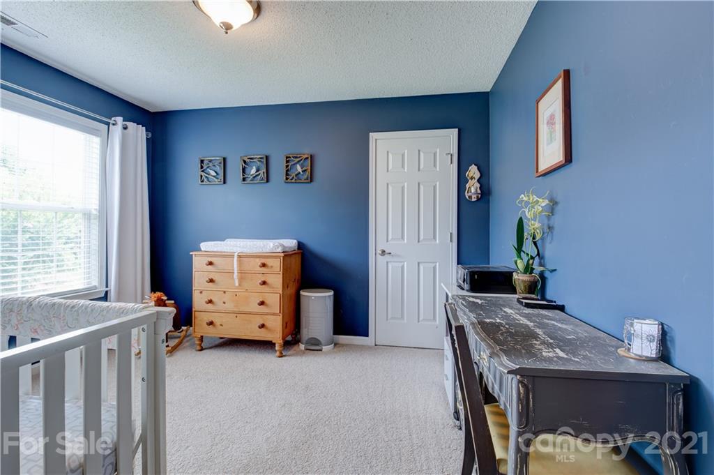 127 Yadkin Road Fletcher, NC 28732 - Photo 17 of 25 a view of a livingroom with furniture