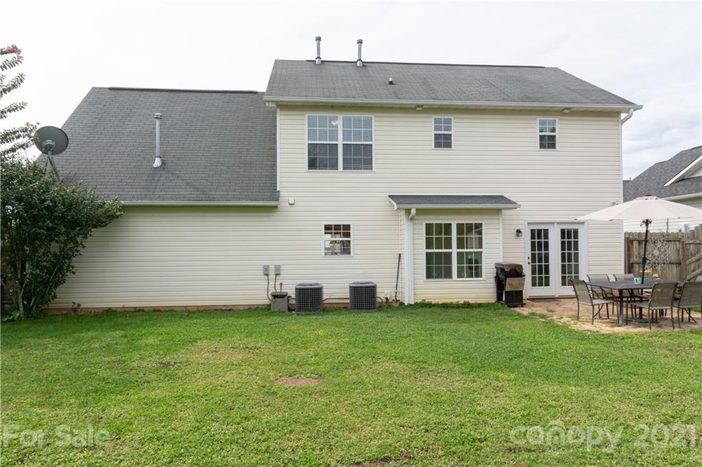127 Yadkin Road Fletcher, NC 28732 - Photo 21 of 25 a view of a house with a yard and sitting space