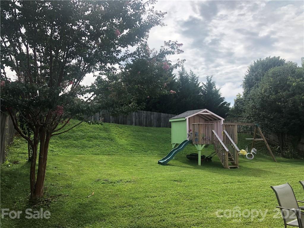 127 Yadkin Road Fletcher, NC 28732 - Photo 25 of 25 a view of a park with slide