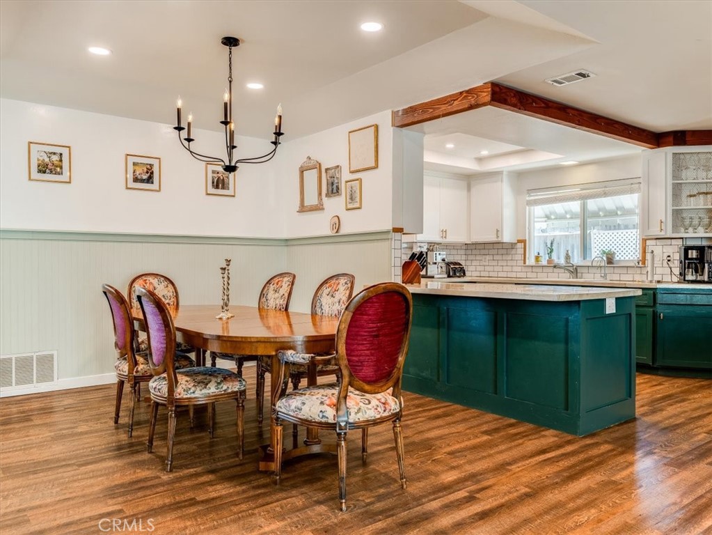 5435 Del Norte Way Santa Maria, CA 93455 - Photo 22 of 60 a view of a dining room with furniture and wooden floor
