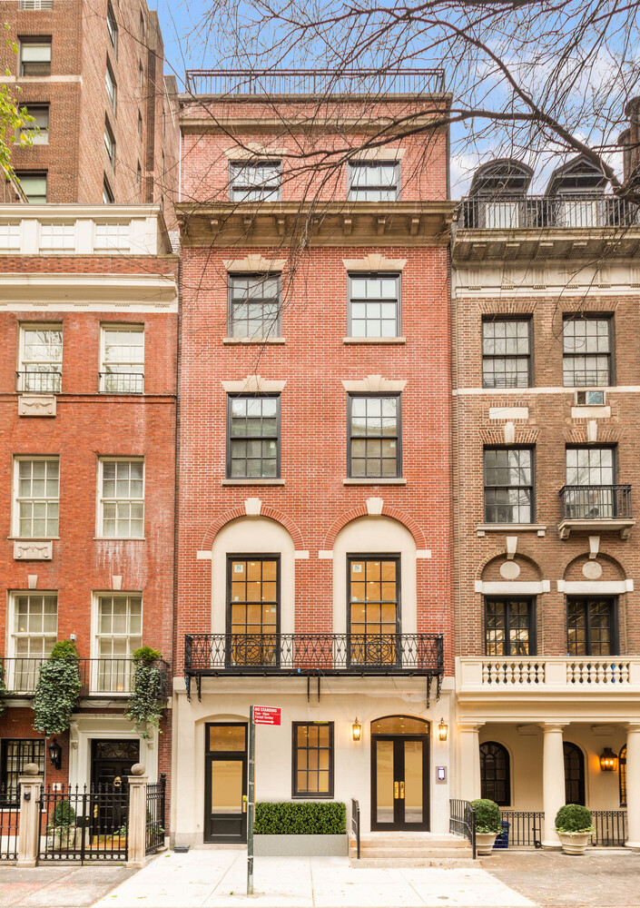 46 East 65th Street, Unit 4 Manhattan, NY 10065 - Photo 14 of 18 a front view of a multi story building