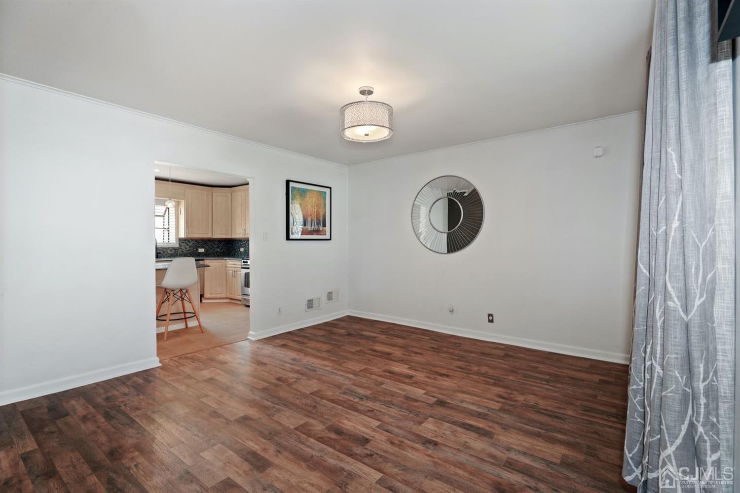 575 New Dover Road Iselin, NJ 08830 - Photo 14 of 28 a view of a livingroom with wooden floor