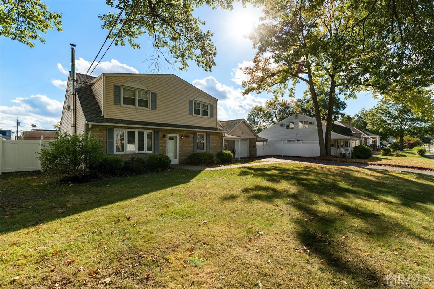 575 New Dover Road Iselin, NJ 08830 - Photo 3 of 28 a view of a house with a yard