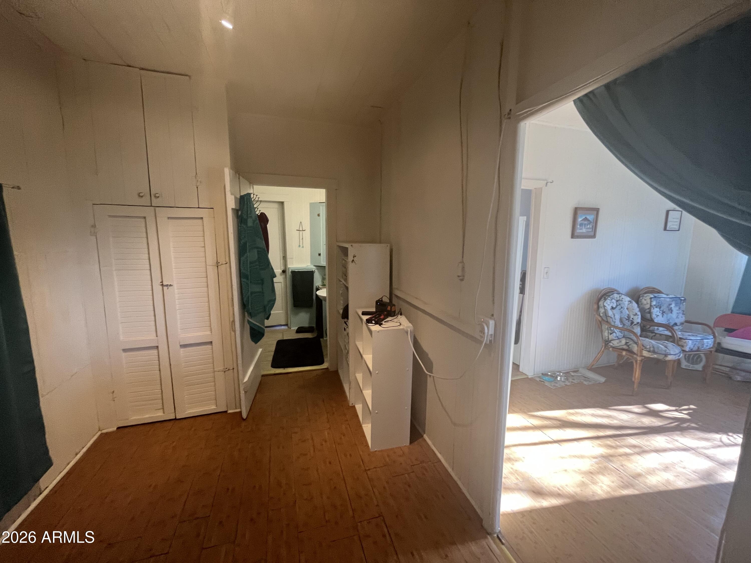 640 West Rocalla Avenue Ajo, AZ 85321 - Photo 13 of 27 a view of a hallway to a livingroom with furniture