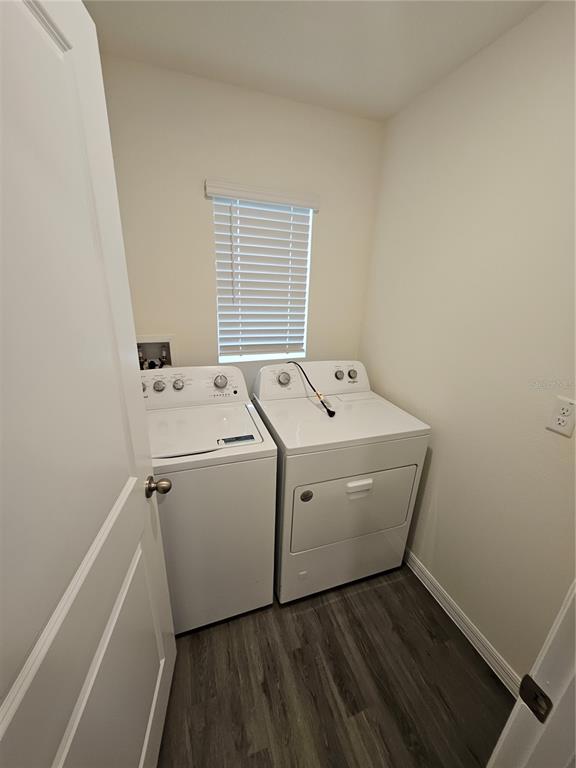 2636 Hardin Way Zephyrhills, FL 33541 - Photo 23 of 42 a utility room with dryer and washer