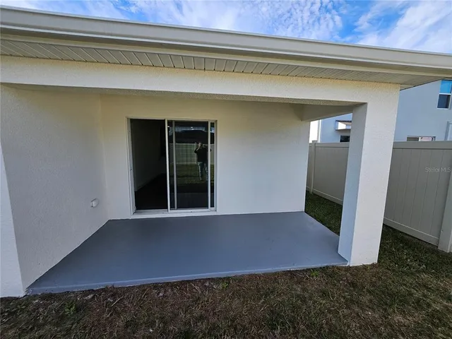 a view of back yard of the house