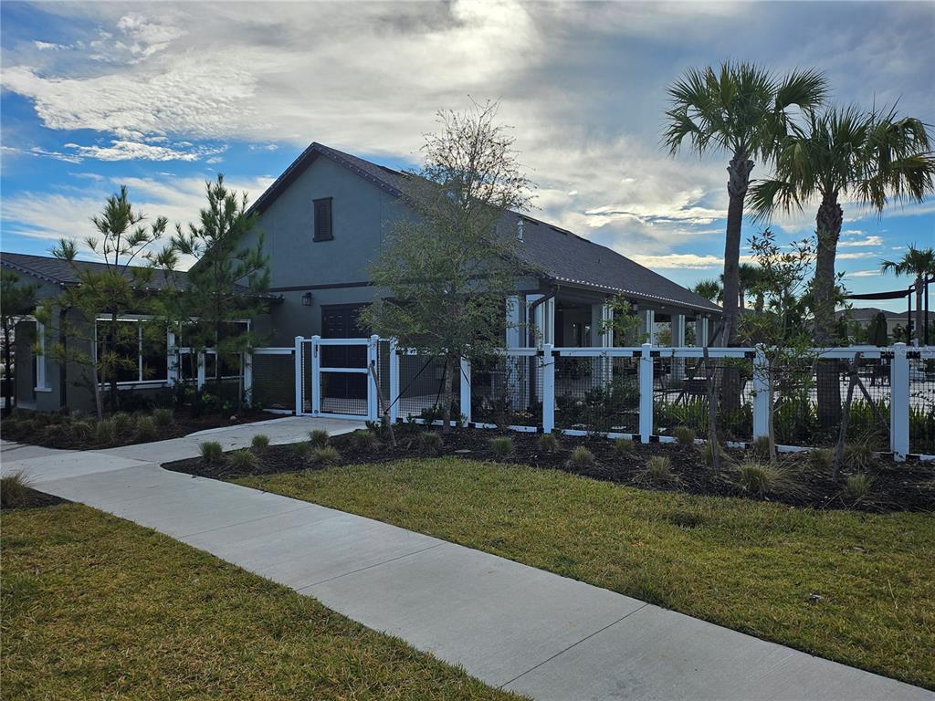 2636 Hardin Way Zephyrhills, FL 33541 - Photo 34 of 42 front view of a house with a yard