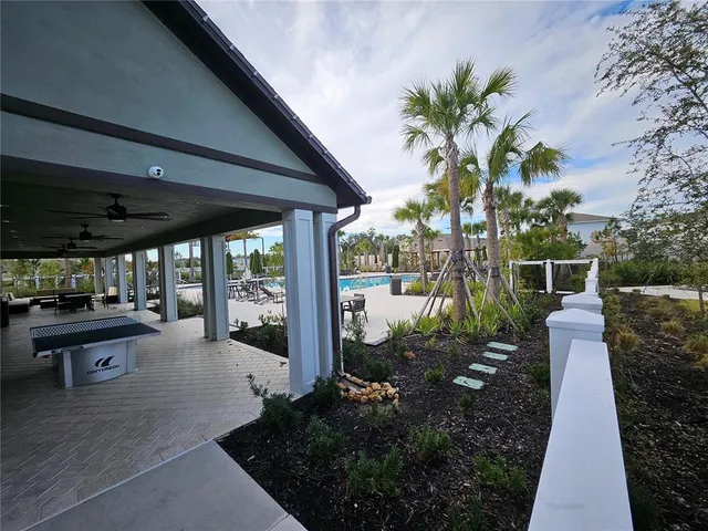 a lobby with furniture and window