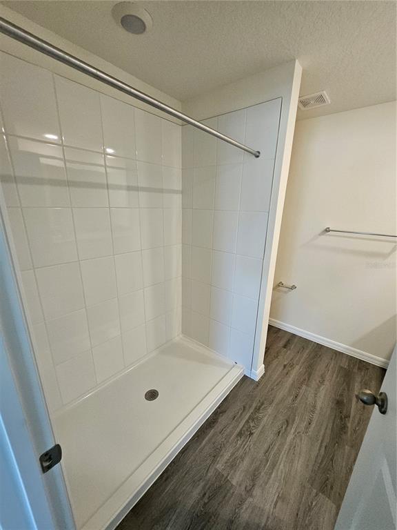 2636 Hardin Way Zephyrhills, FL 33541 - Photo 8 of 42 a bathroom with a shower