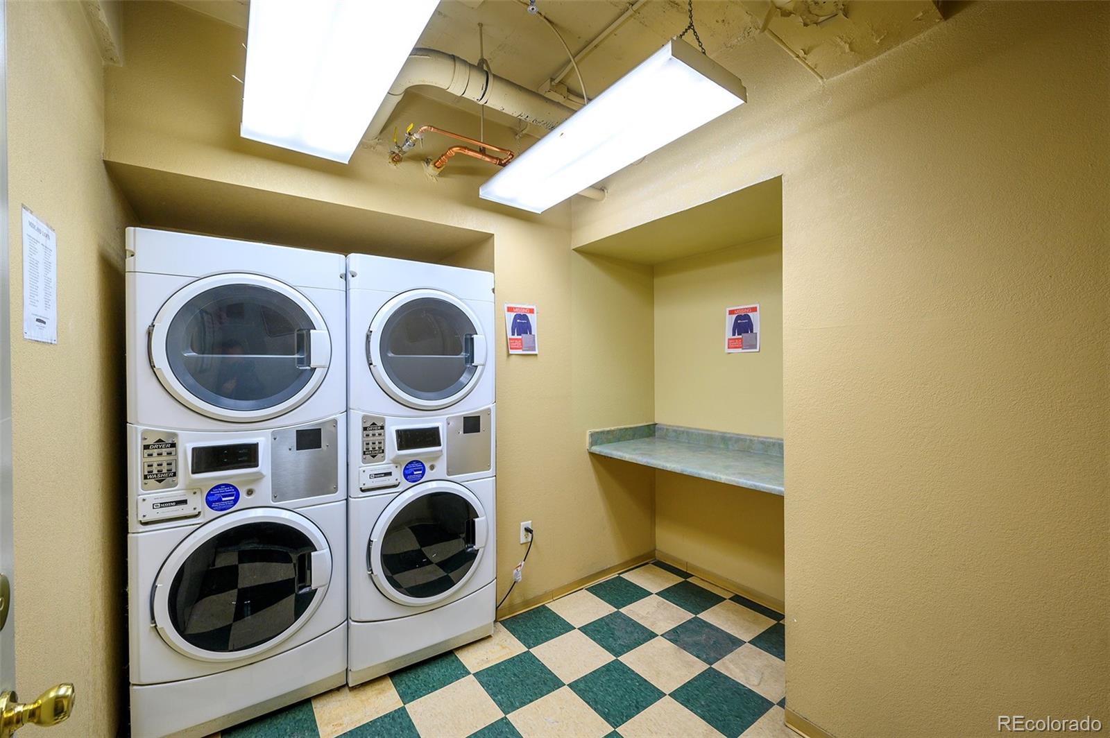 444 17th Street, Unit 904 Denver, CO 80202 - Photo 17 of 18 a utility room with dryer and washer