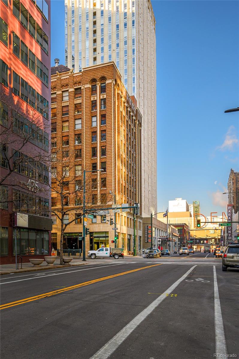 444 17th Street, Unit 904 Denver, CO 80202 - Photo 3 of 18 a city street with tall buildings and a street