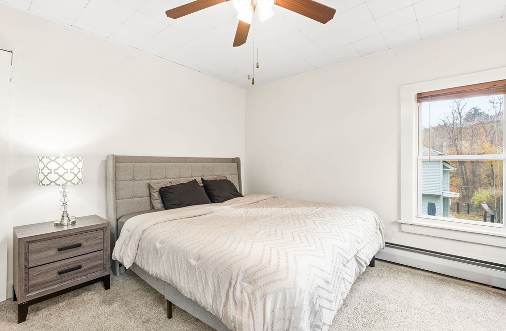 23 Fletcher Place Athol, MA 01331 - Photo 15 of 29 a bedroom with a bed and a window