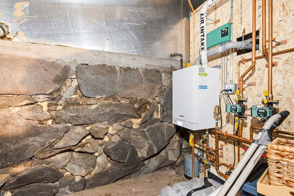 23 Fletcher Place Athol, MA 01331 - Photo 20 of 29 a bathroom with a sink toilet and mirror