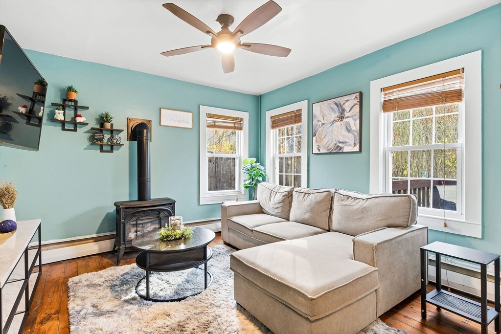 23 Fletcher Place Athol, MA 01331 - Photo 2 of 29 a living room with furniture and a large window