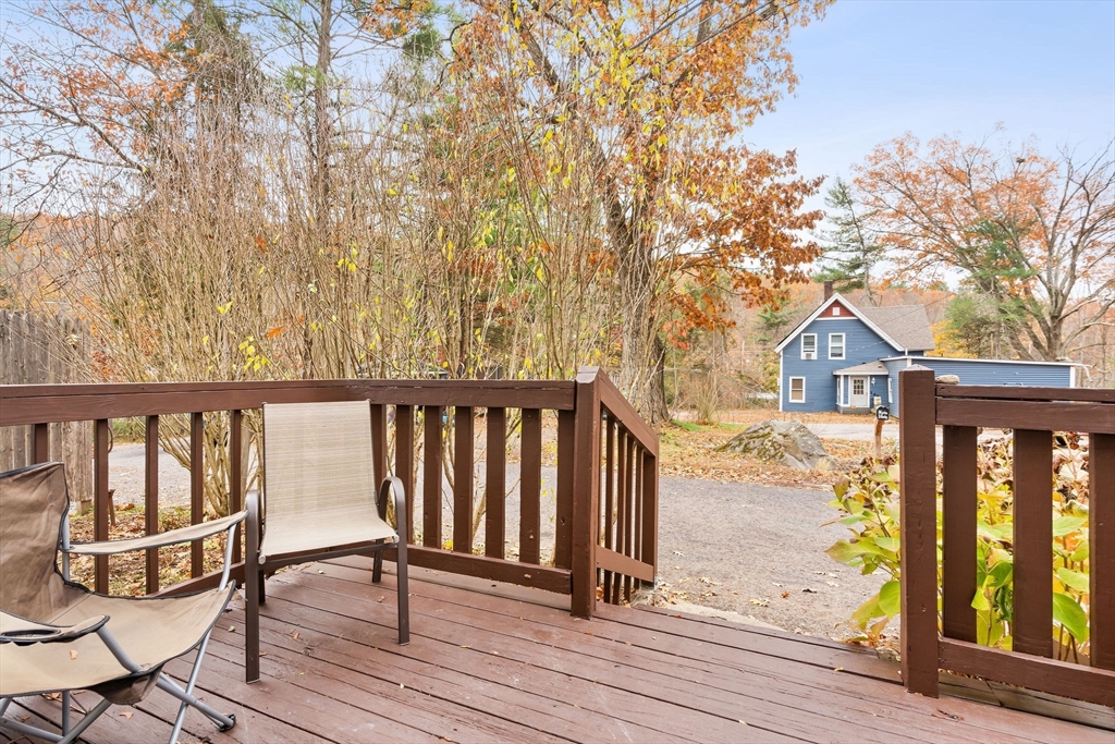 23 Fletcher Place Athol, MA 01331 - Photo 21 of 29 a view of wooden balcony with a bench