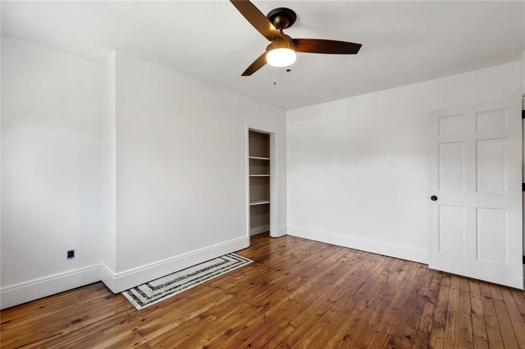 324 Merrimac Street Pittsburgh, PA 15211 - Photo 27 of 37 wooden floor in an empty room