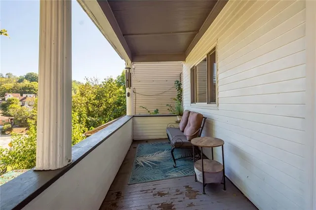 a view of a two chair in the balcony