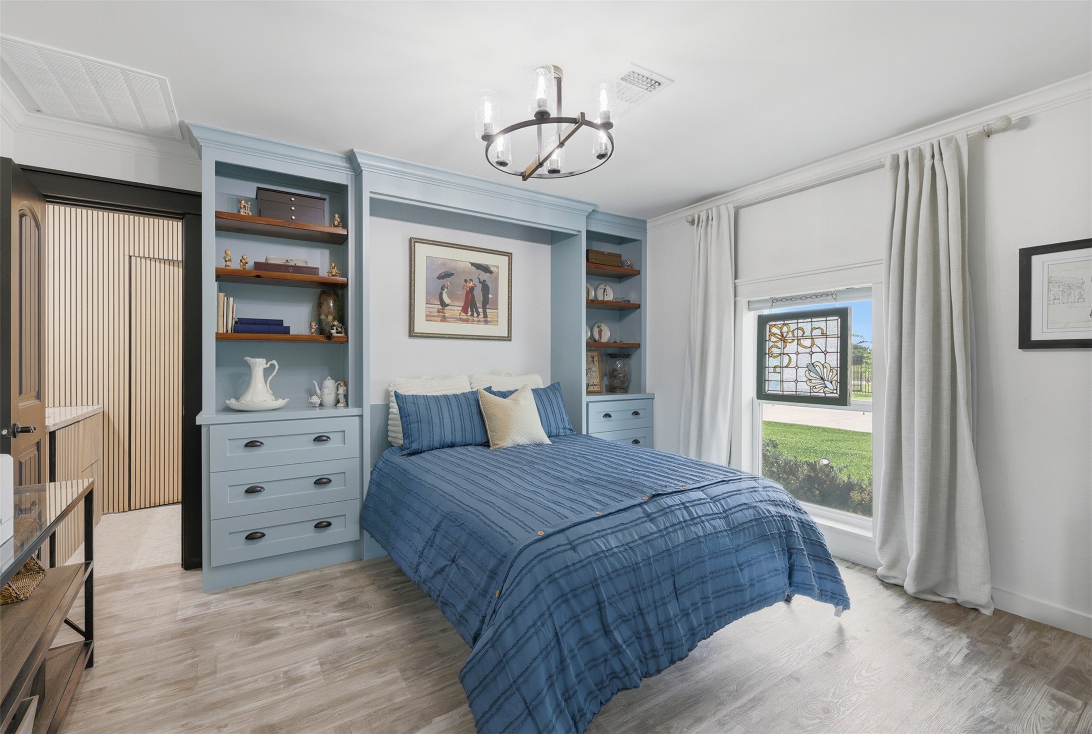 5111 Brookside Road Pearland, TX 77581 - Photo 24 of 42 Custom designed Murphy bed room with private bathroom offering incredible flexibility for guests or multigenerational living.