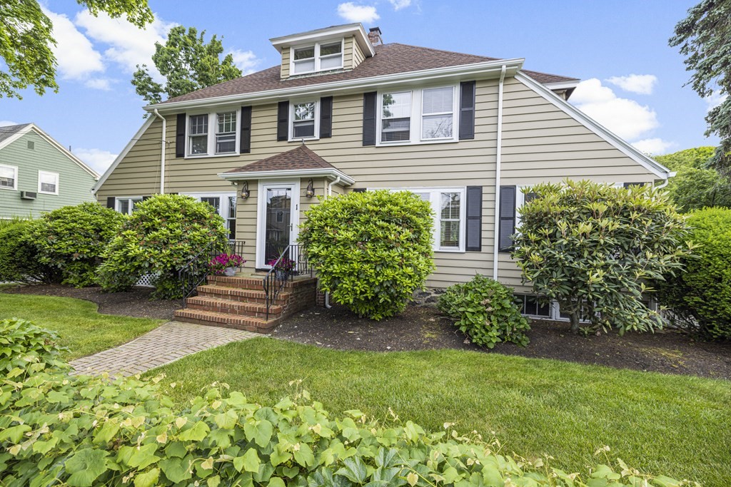 1 Auburndale Road Marblehead, MA 01945 - Photo 1 of 29 a front view of a house with garden